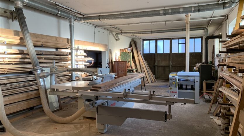 Wohnhaus mit Garage und Garten, ehem. Kfz-Werkstatt mit Waschhalle